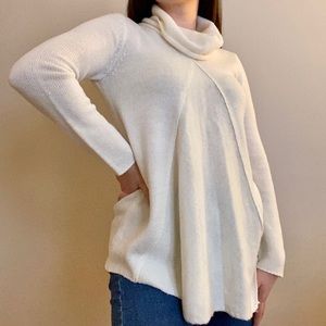 Flowy white cowl neck sweater.
